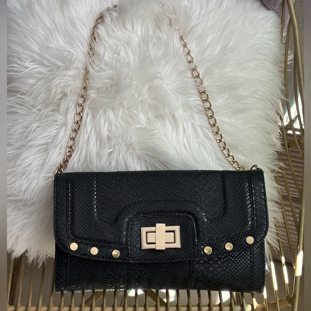 Cache vintage clutch with gold hardware. Barely used.